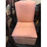 PEACH COLOURED UPHOLSTERED BEDROOM CHAIR