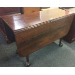 MAHOGANY GEORGE II TABLE ON BALL & CLAW FEET