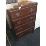 MAHOGANY CHEST OF 4 DRAWERS WITH METAL HANDLES