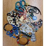 TIN OF COSTUME JEWELLERY INCL; BONE BRACELET & BONE NECKLACE