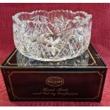 A BOXED CUT GLASS LEAD CRYSTAL FRUIT BOWL TOGETHER WITH TWO OTHER DECORATIVE PIECES OF TABLE GLASS.