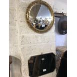 GILT FRAMED CONVEX MIRROR & A FRAMELESS BEVELLED EDGE MIRROR