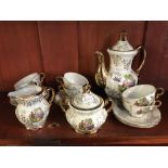 A DECORATIVE TEA SET