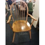 LIGHT OAK SPINDLE BACK ELBOW CHAIR
