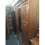 CARVED WOOD TRIPLE WARDROBE WITH 1 LONG & 3 SHORT DRAWERS INSIDE & CENTRAL BEVELLED EDGE FULL