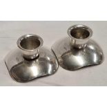 PAIR OF SILVER PLATE REVERSIBLE CANDLESTICKS, MARKED MADE IN DENMARK