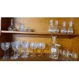 2 SHELVES OF GLASSWARE, DECANTER STOPPERS,WINE GLASSES, JUG ETC