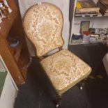 BEDROOM CHAIR ROUNDED BACK GOLD UPHOLSTERY WITH FLOWER DESIGN ON TURNED LEGS