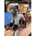 A DEANS CHILD PLAY TOY OF A DONKEY ON 4 WHEELS A/F