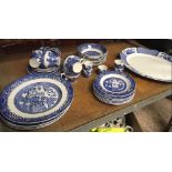 SHELF OF BLUE & WHITE WILLOW PATTERN BY WOODS & A MEAT PLATE