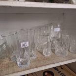 SHELF OF GLASSWARE WITH A FRUIT BOWL ETC