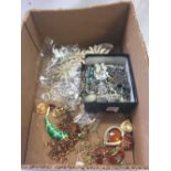 SMALL CARTON OF MIXED GOLD & SILVER COLOURED COSTUME JEWELLERY, CHAINS, BROOCHES ETC