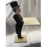 WOOD CARVING OF A BUTLER WITH TRAY