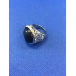 LARGE WHITE METAL RING WITH BLACK STONE