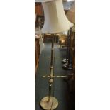 AN ONYX & BRASS EFFECT STANDARD LAMP WITH SHADE
