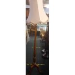 LIGHT MAHOGANY STANDARD LAMP ON TRIPLE BALL & CLAW LEGS