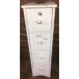 WHITE RACK OF FOUR DRAWERS WITH MANY CLOCK SPRING BARRELS & ODD PARTS FROM OLD CLOCKS