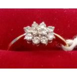 AN ATTRACTIVE 10 STONE DIAMOND RING SET IN 18ct GOLD