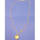 A SMALL 9ct BACK & FRONT HEART LOCKET ON 9ct NECK CHAIN
