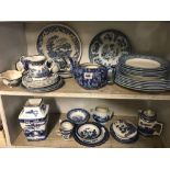 2 SHELVES OF BLUE & WHITE CHINAWARE CONSISTING OF CHURCHILL CHINAWARE ETC