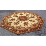 AN OCTOGAN SHAPED 8ft X 4'' PATTERNED RUG