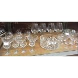 SHELF OF VARIOUS DRINKING GLASSES, DECANTERS, ICE CREAM FRUIT BOWLS, GLASS DISHES, BOWL WITH