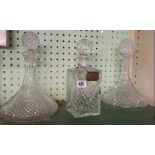 A PAIR OF SHIP DECANTERS & A DECANTER WITH WHISKY LABEL