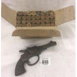 DIXIE TOY CAP GUN & A BOX F USED MILITARY 303 CARTRIDGE CASES