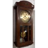 1920'S OAK & BRASS FACED WALL CLOCK ( NO STRIKE TRAIN) OTHERWISE WORKING ORDER