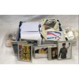 LARGE QTY OF ROYAL MAIL POSTAGE POSTCARDS & LOOSE USED MAIL STAMPS IN ENVELOPES & 2 TUBS OF USED