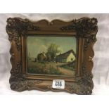 SMALL OIL PAINTING ON BOARD IN A DECORATIVE GILT FRAME, HEAVY HORSES PULLING A HAY CART PAST A