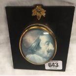 A MINIATURE PORTRAIT OF A GENT IN A BLACK FRAME (PRINT?) WITH GILT OAK LEAF AND ACORN HANGER