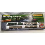 HORNBY FLYING SCOTTSMAN ELECTRIC TRAIN SET, (BOXED & NEVER BEEN USED)