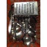 PLASTIC CARTON OF STAINLESS STEEL CUTLERY MAINLY SPOONS & A GRATER