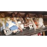 SHELF OF MISC PORCELAIN DOLLS ON STANDS & 1 OTHER PLASTIC IN BOX