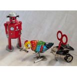 3 TIN PLATE WIND UP TOYS, THE ATOMIC ROBOT MAN, PECKY HEN & 1 OTHER