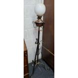 BRASS & COPPER OIL LAMP ON WROUGHT IRON STAND