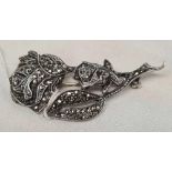 A SILVER & MARCASITE ROSE BROOCH