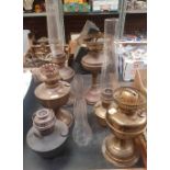 4 VINTAGE ALADDIN BRASS PARAFFIN OIL LAMPS, 2 DUPLEX LAMPS & 4 GLASS CHIMNEYS