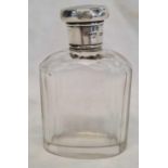 AN OVAL SCENT BOTTLE WITH SILVER OVER - LONDON 1914