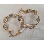 A PAIR OF 9ct GOLD TWIST HOOP EARRINGS