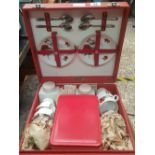A BREXTON PICNIC SET IN RED CARRY CASE