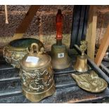 ONE BRASS WOOD HANDLED HAND BELL, BRASS TABLE BELL, FOX MASK ASHTRAY, BUDDHA BELL& A BRASS ORNATE