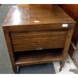 SMALL 1960'S LP CABINET WITH ROLLER DOOR ON CASTERS