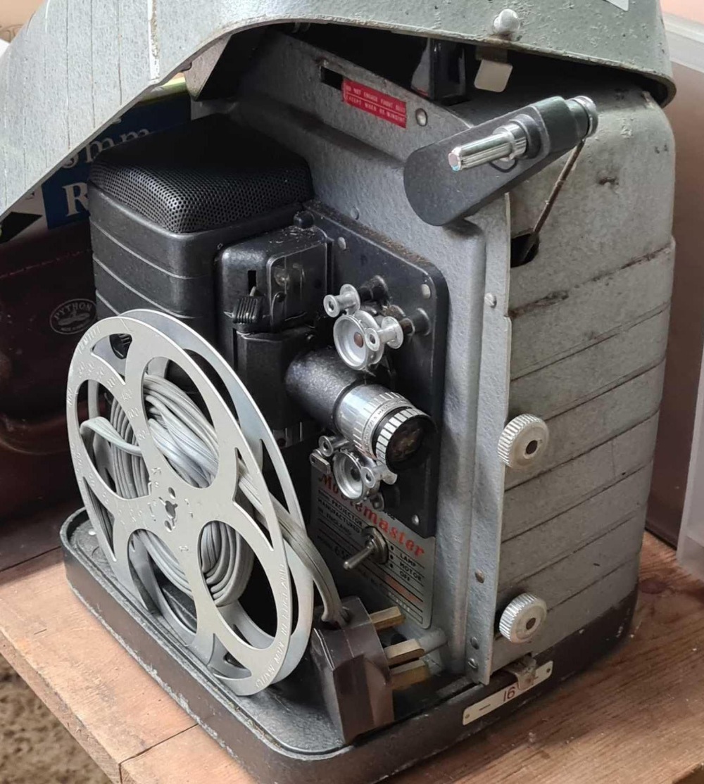 A BELL & HOWELL MODEL 635 PROJECTOR WITH SMALL ATTACHÉ CASE OF VARIOUS FILMS & FILM SPLICER - Image 2 of 3