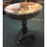 HEAVILY CARVED CIRCULAR TEAK TRIPOD TABLE, IN GOOD CONDITION, 22'' DIA