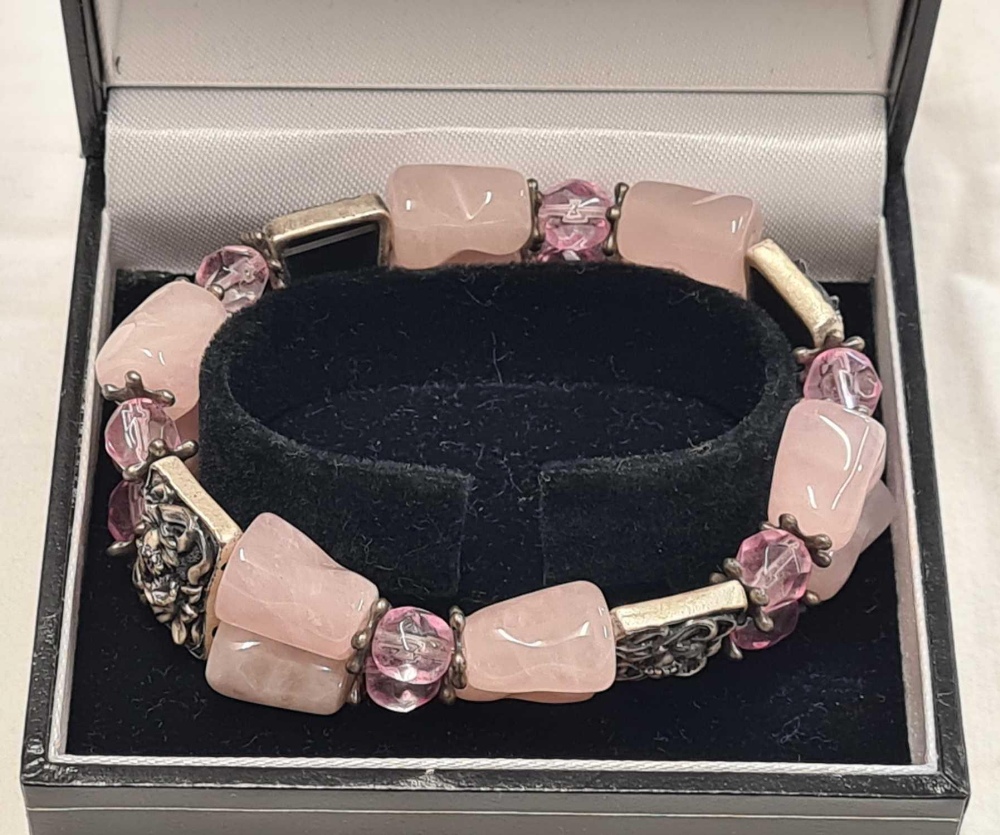 A PINK QUARTZ, BEAD AND WHITE METAL BRACELET IN THE ART DECO STYLE