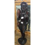 CARVED MAHOGANY ETHNIC FIGURE OF A HUNTER WITH RABBIT, 26'' HIGH APPROX