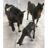 2 BROWN ROYAL DOULTON HORSES & A FOAL