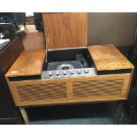 A VINTAGE MARCONIPHONE STEREOPHONIC SOLID STATE RADIOGRAM, 1950'S